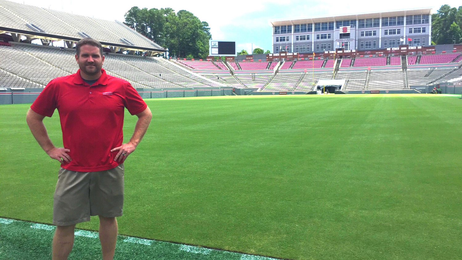 Jonathan Stephens stands in the end zone at Carter-Finley Stadium.