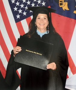 Mindy McDowell graduation photo.