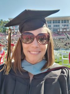Sybil McCarrol in cap and gown at the Spring 2021 Commencement Ceremony at Carter-Finley Stadium
