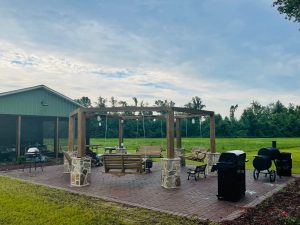 Firepit circle with hanging benches.