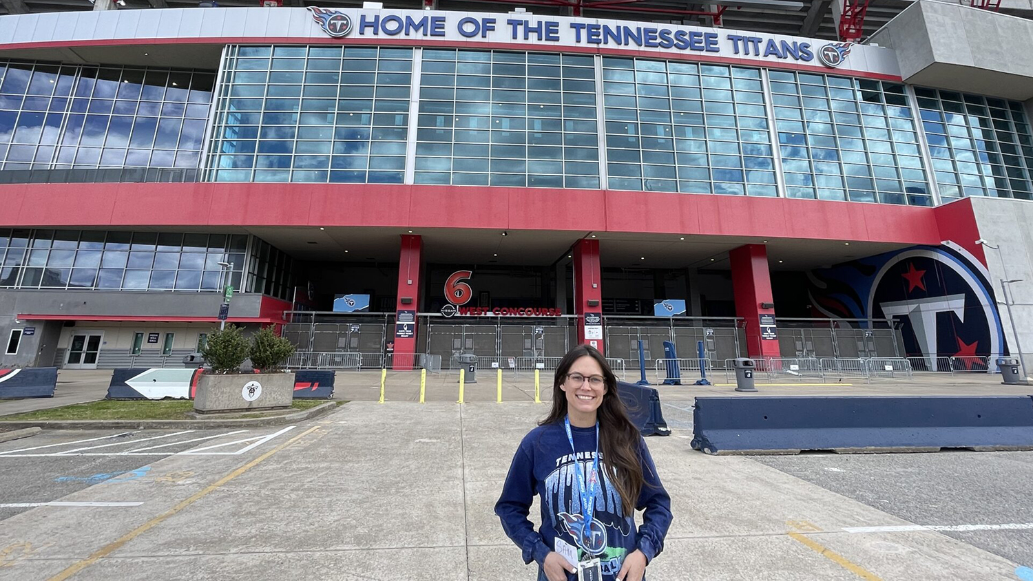 Sam Fischer poses outside of the Tennessee Titans stadium.