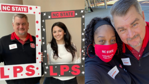 Keith and Ermina hold LPS border signs. Keith and Dr. Waters pose for a selfie.