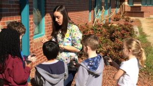 Teacher with young students