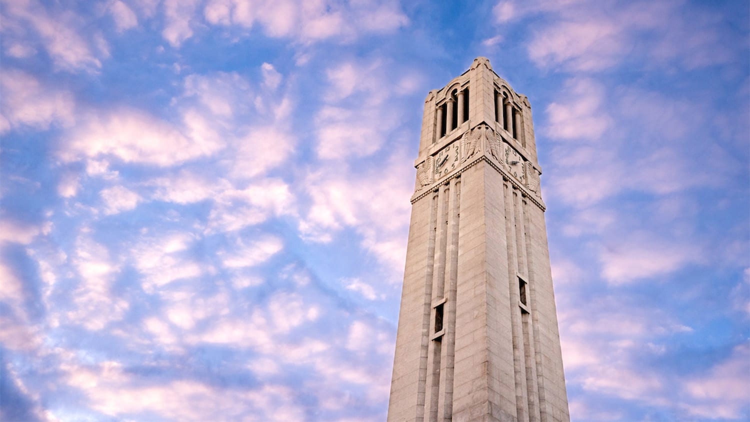 NC State's Memorial Belltower among evening clouds