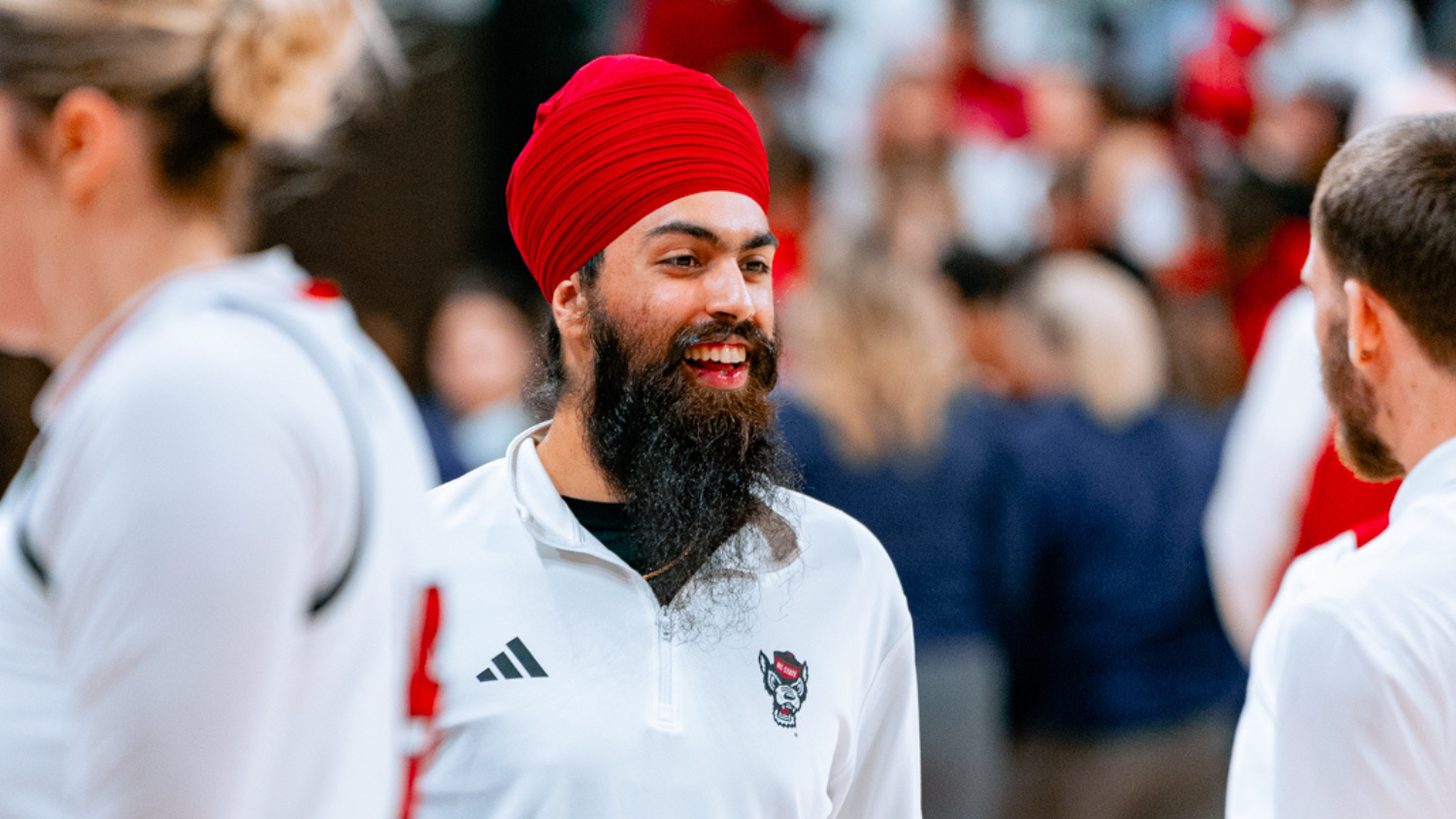 Darasjot Hothi, LPS '25, at an NC State Wolfpack women's basketball game.